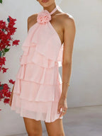 Women’s halter neck ruffled dress with floral accents