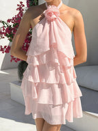Women’s halter neck ruffled dress with floral accents